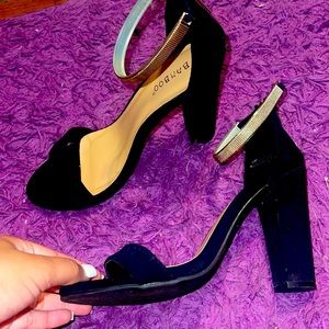Black block heels with gold ankle strap